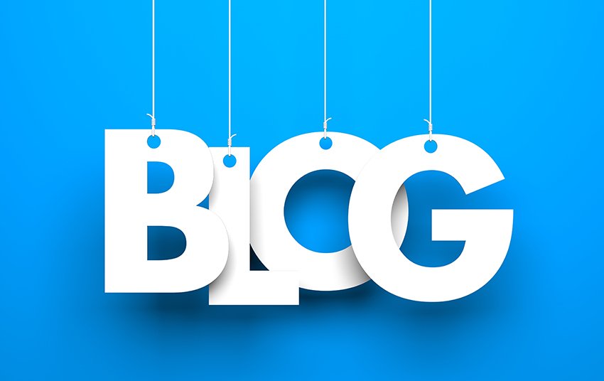 Four white letters spelling the word blog, hanging from strings over a blue background.